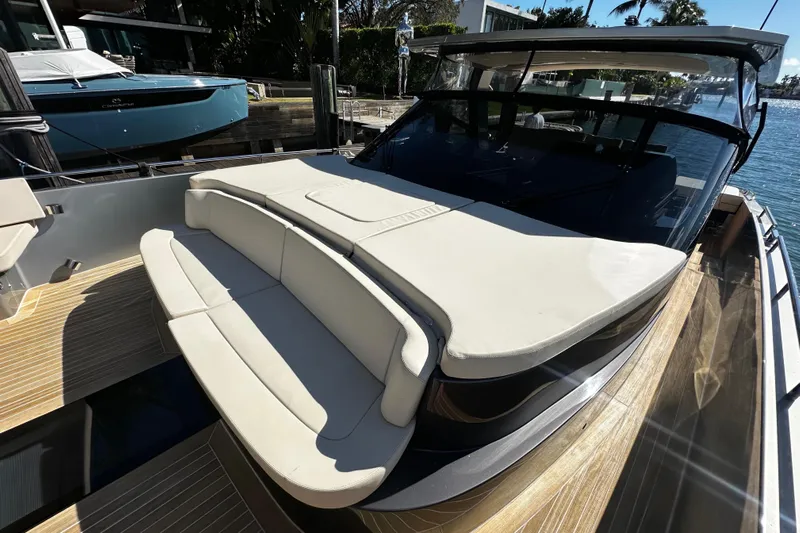 Yanina Yacht Photos Pics Luxurious 2019 CNM 54 yacht with spacious sun deck and elegant seating area.
