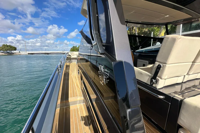 Yanina Yacht Photos Pics Luxurious CNM 54 yacht deck with sleek design, cruising on a sunny day, 2019 model.