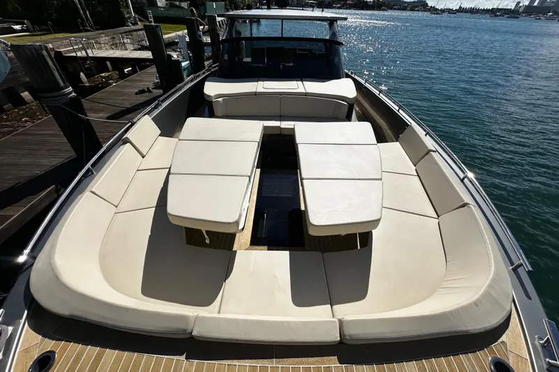 Yanina Yacht Photos Pics Luxurious 2019 CNM 54 yacht with spacious deck seating and elegant design.