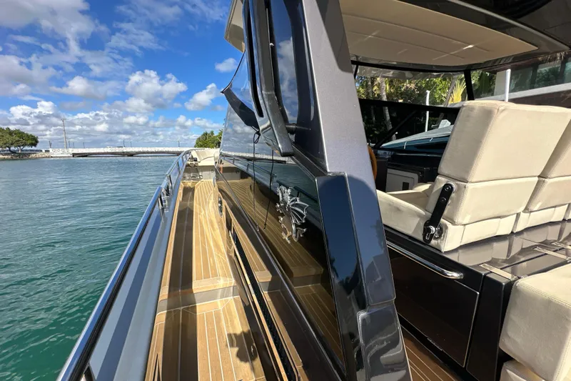 Yanina Yacht Photos Pics Luxurious CNM 54 yacht deck with sleek design, cruising on a sunny day, 2019 model.