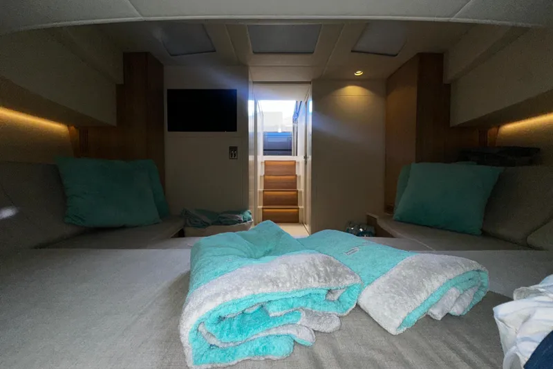 Yanina Yacht Photos Pics Luxurious CNM 54 yacht interior, 2019 model, featuring cozy seating and elegant decor.