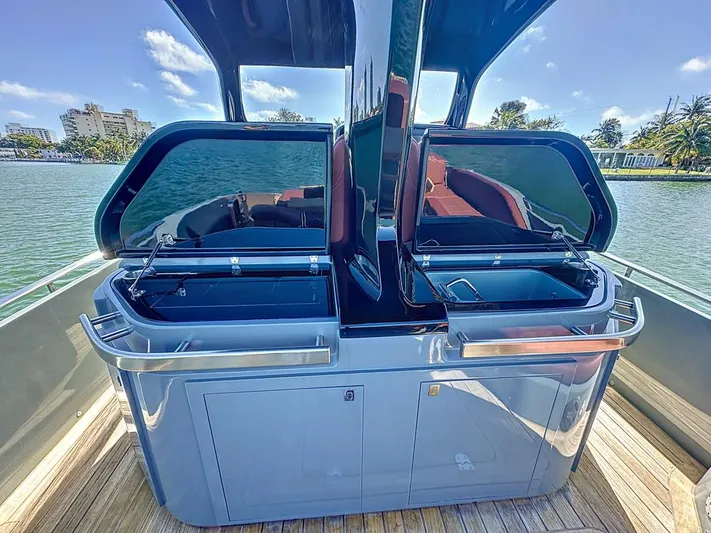 B-offline Yacht Photos Pics 2019 SACS Rebel 40 yacht with sleek outdoor kitchen on deck, featuring dual sinks and storage.