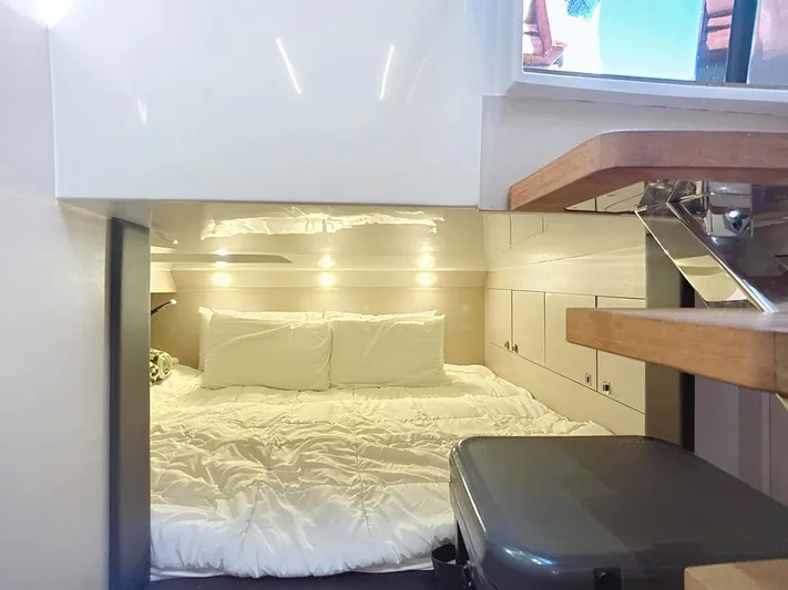 B-offline Yacht Photos Pics Interior cabin of 2019 SACS Rebel 40 yacht with cozy bed and modern design.