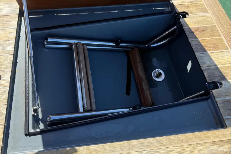 B-offline Yacht Photos Pics Foldable ladder compartment on 2019 SACS Rebel 40 boat deck.
