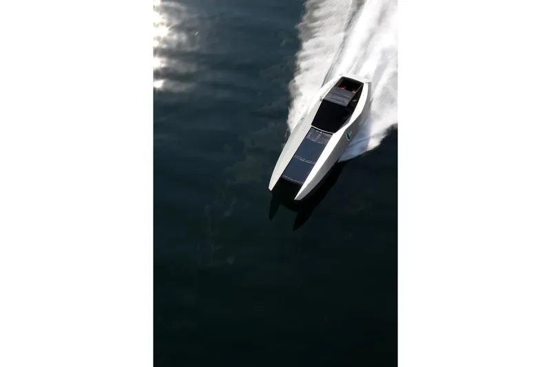 No Name Yacht Photos Pics 2025 Offshore Racing Code X speedboat gliding swiftly on water.