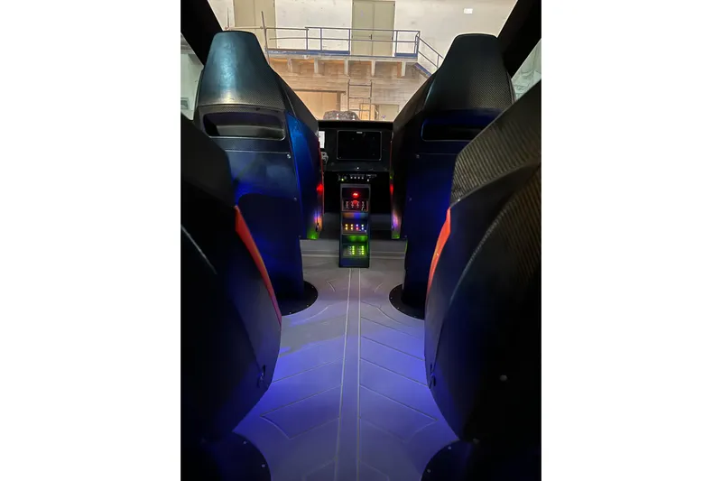No Name Yacht Photos Pics Interior of 2025 Offshore Racing Code X boat with illuminated control panel.