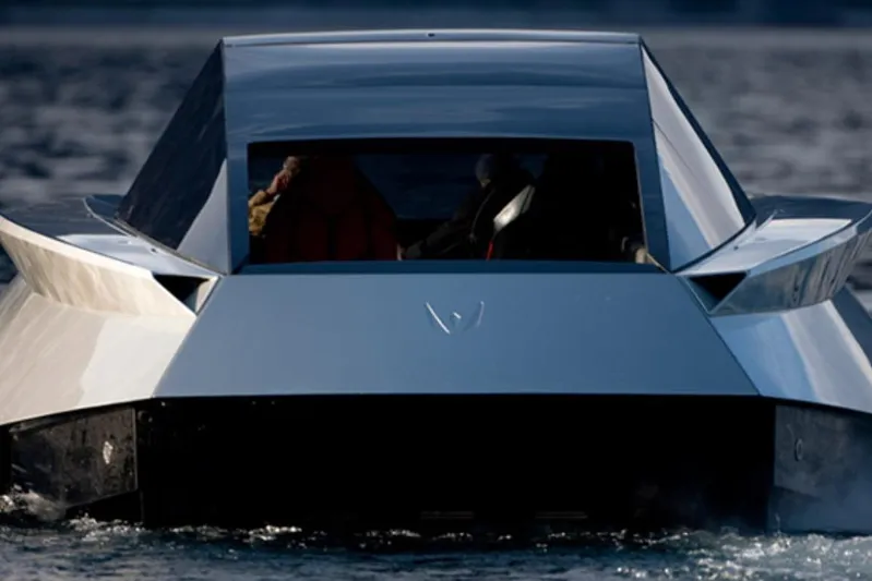 No Name Yacht Photos Pics Futuristic 2025 Offshore Racing Code X boat on water, sleek design, modern technology.