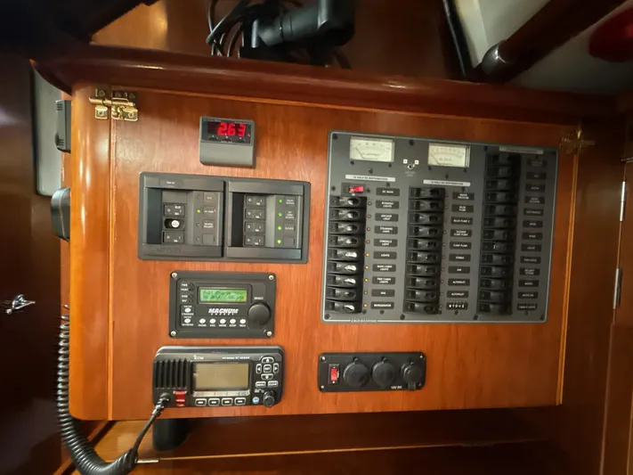 Gonzo Yacht Photos Pics Electrical control panel on a 1997 Beneteau 50 yacht, featuring switches and meters.