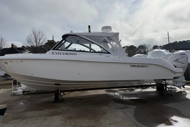 Untethered Yacht Photos Pics 2020 Everglades 340 Dual Console boat on display, side view, outdoors.