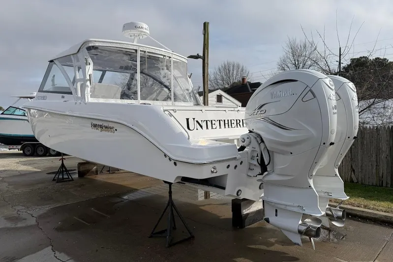 Untethered Yacht Photos Pics 2020 Everglades 340 Dual Console boat with twin Yamaha engines on display.