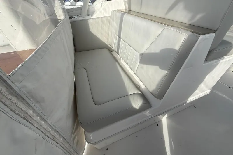 Untethered Yacht Photos Pics White seating area on a 2020 Everglades 340 Dual Console boat.