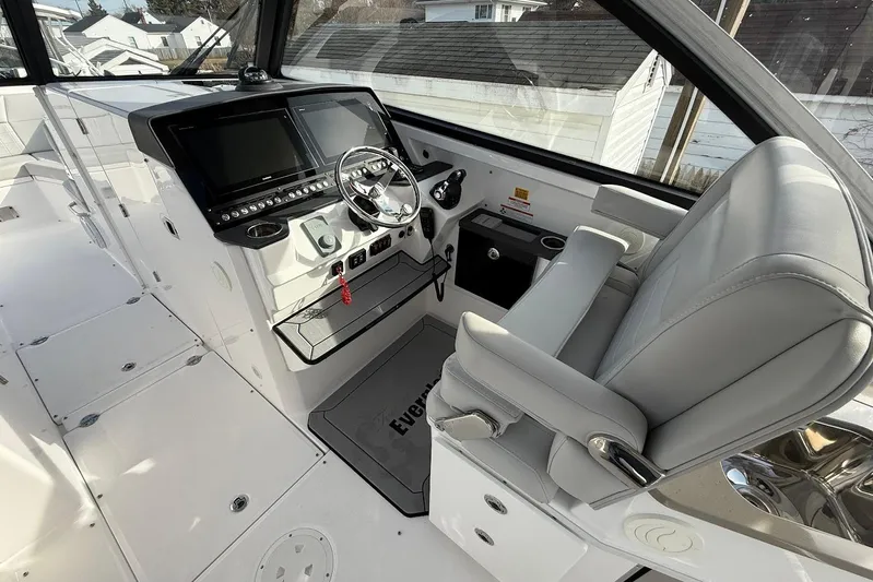 Untethered Yacht Photos Pics 2020 Everglades 340 Dual Console boat interior with modern helm and seating.