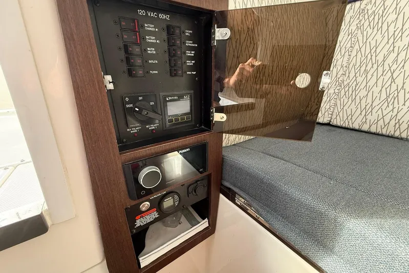 Untethered Yacht Photos Pics Electrical panel inside 2020 Everglades 340 Dual Console boat, featuring switches and controls.