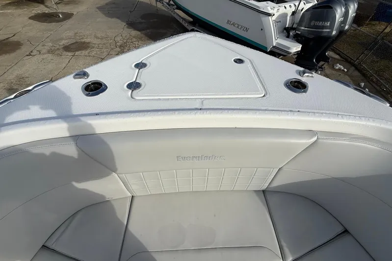 Untethered Yacht Photos Pics 2020 Everglades 340 Dual Console boat interior with white seating and deck details.