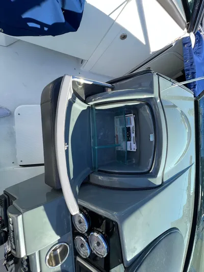  Yacht Photos Pics 2014 Formula 350 Crossover Bowrider dashboard with open glove compartment.