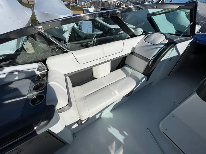  Yacht Photos Pics 2014 Formula 350 Crossover Bowrider interior seating area with white upholstery.