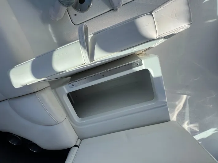  Yacht Photos Pics 2014 Formula 350 Crossover Bowrider interior storage compartment with white seating.