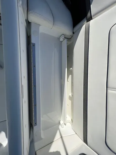  Yacht Photos Pics 2014 Formula 350 Crossover Bowrider interior seating and storage compartment.