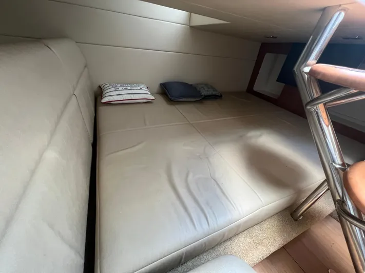  Yacht Photos Pics 2014 Formula 350 Crossover Bowrider cabin interior with bed and pillows.