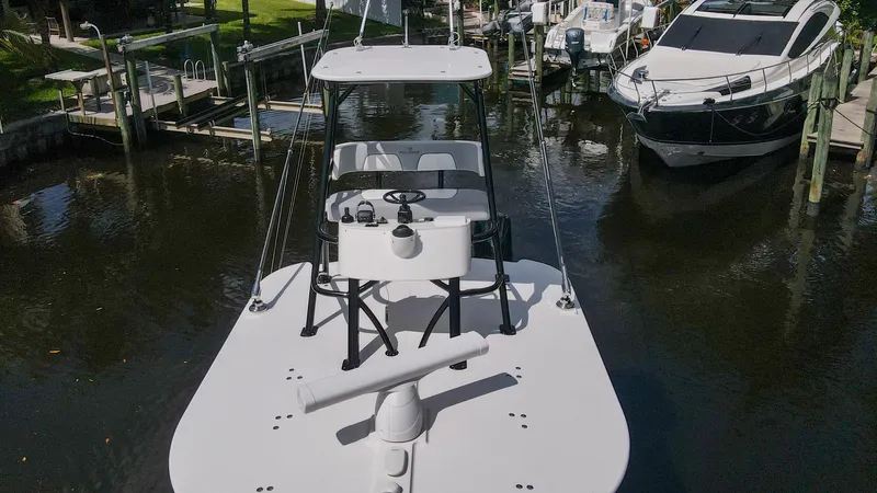 Grey Hull Yacht Photos Pics 2020 Regulator 41 boat docked in a marina.