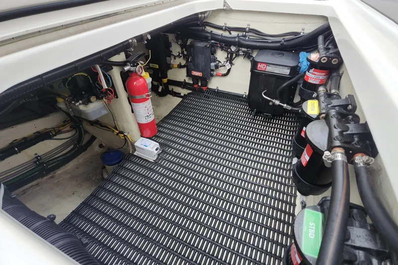  Yacht Photos Pics Engine compartment of 2025 Fountain 38 SCX boat with fire extinguisher and wiring.