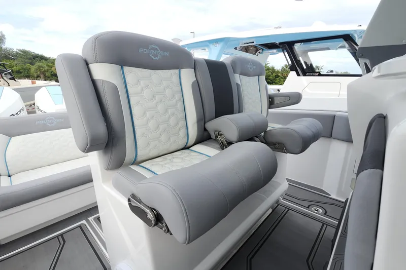  Yacht Photos Pics Luxury seating on 2025 Fountain 38 SCX boat, featuring modern design and comfort.