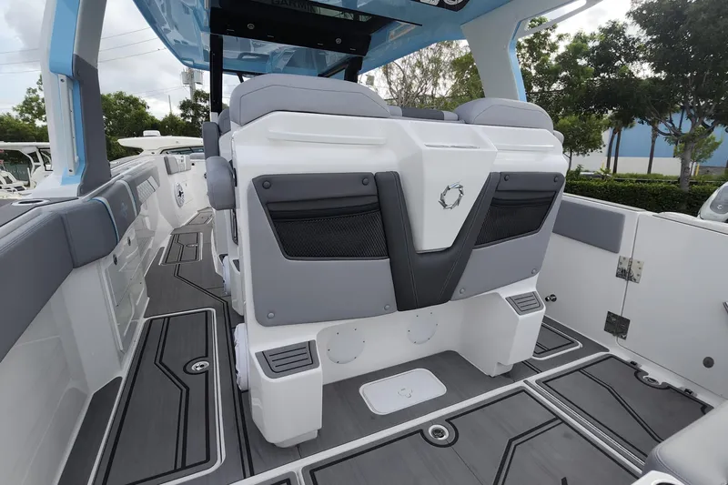  Yacht Photos Pics 2025 Fountain 38 SCX boat interior with modern seating and sleek design.