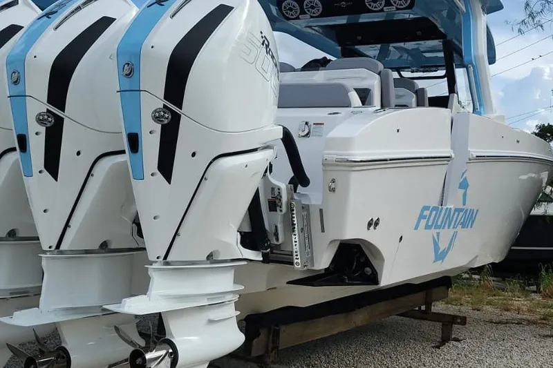  Yacht Photos Pics 2025 Fountain 38 SCX boat with dual outboard engines, sleek design, and modern features.