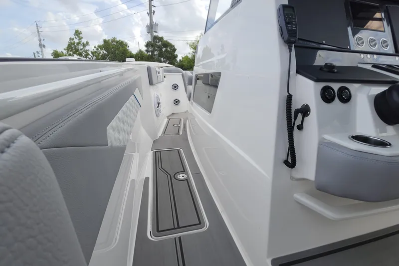  Yacht Photos Pics 2025 Fountain 38 SCX boat interior with sleek design and modern controls.