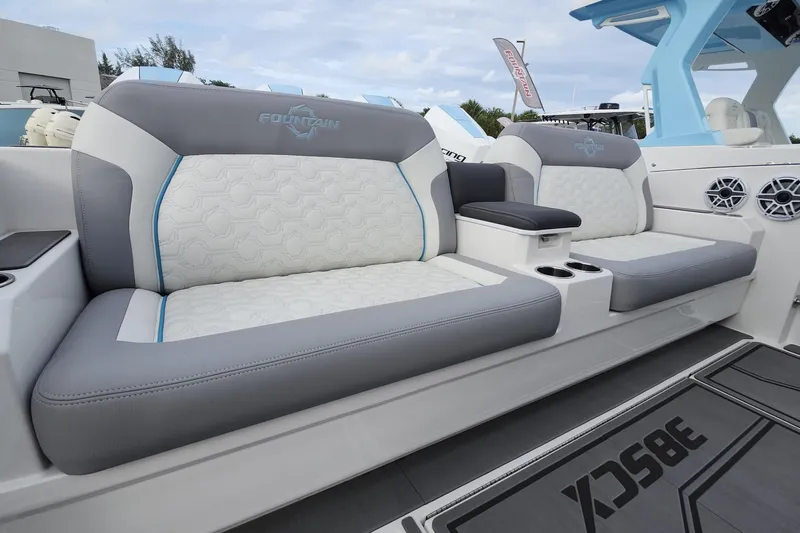  Yacht Photos Pics 2025 Fountain 38 SCX boat interior with stylish gray and white seating.