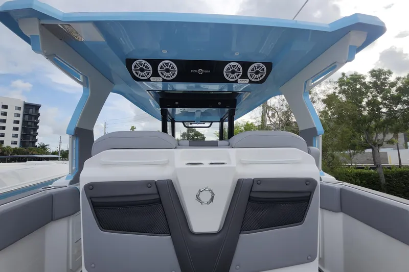  Yacht Photos Pics 2025 Fountain 38 SCX boat interior with modern seating and audio system.