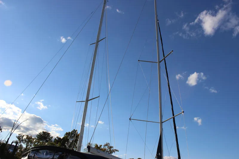  Yacht Photos Pics Sailboat masts against a clear blue sky, Hunter 33 model, 2014.