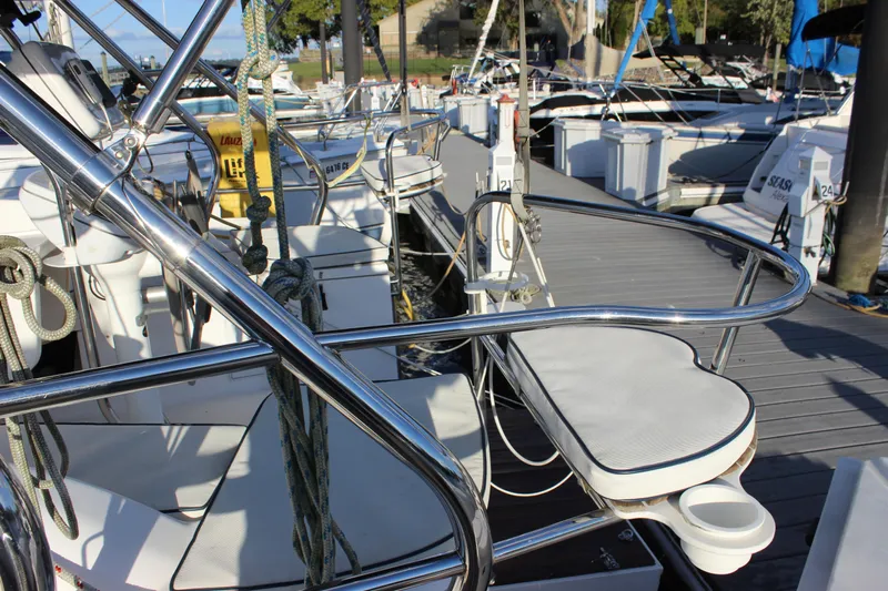  Yacht Photos Pics 2014 Hunter 33 sailboat docked, featuring polished metal railings and deck equipment.