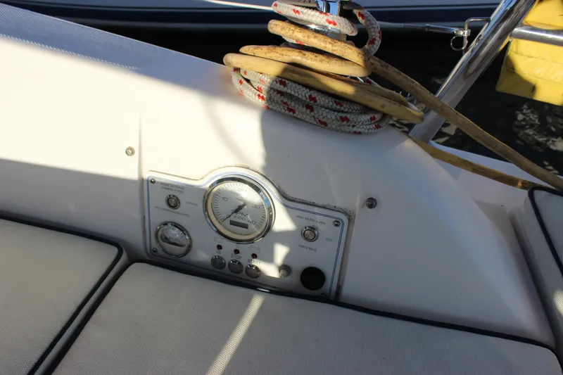  Yacht Photos Pics Control panel of a 2014 Hunter 33 sailboat with coiled rope.