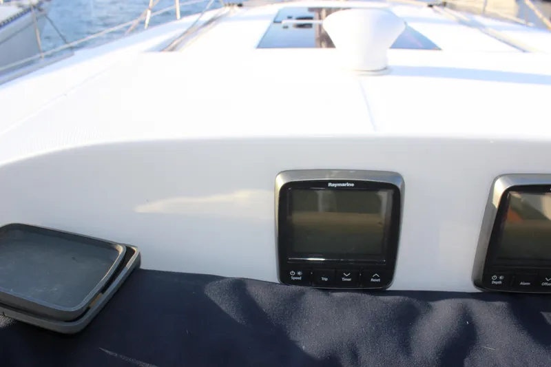 Yacht Photos Pics Cockpit of 2014 Hunter 33 sailboat with Raymarine instruments.