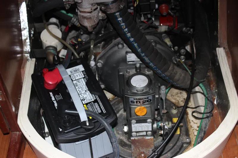  Yacht Photos Pics Engine compartment of a 2014 Hunter 33 sailboat with Yanmar SD20 engine and battery.
