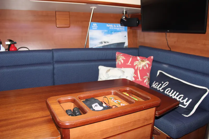  Yacht Photos Pics Interior of 2014 Hunter 33 sailboat with cozy seating and nautical decor.