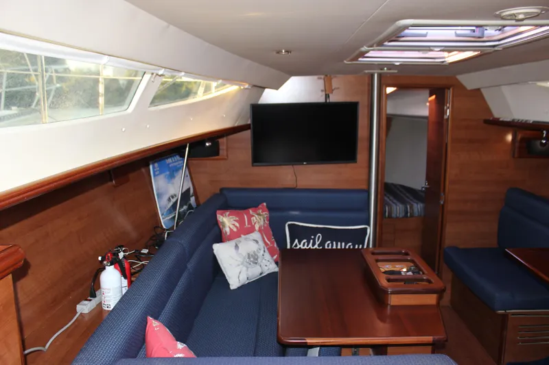 Yacht Photos Pics Interior of 2014 Hunter 33 sailboat with cozy seating and modern amenities.