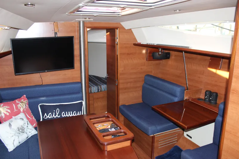  Yacht Photos Pics Interior of 2014 Hunter 33 sailboat with cozy seating and modern amenities.
