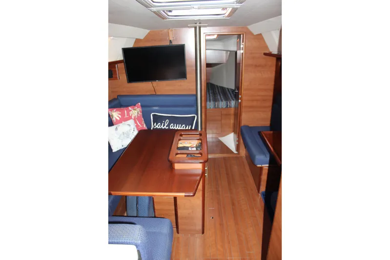  Yacht Photos Pics Interior of 2014 Hunter 33 sailboat with cozy seating and modern amenities.