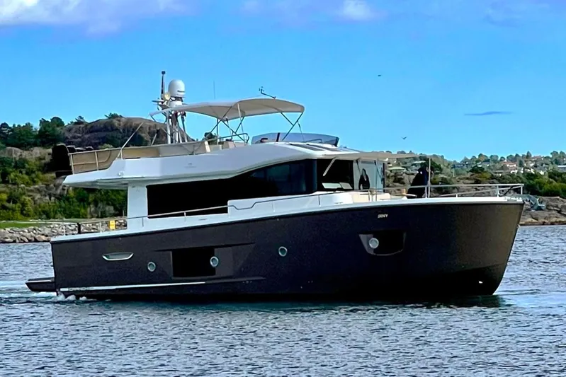  Yacht Photos Pics 2016 Cranchi Eco Trawler 53 Long Distance yacht cruising on a scenic waterway.