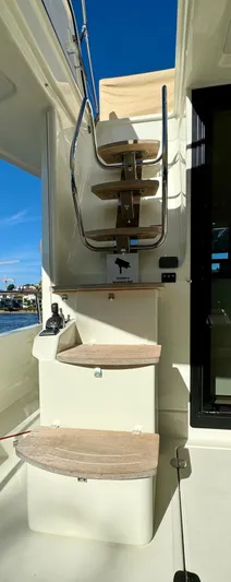  Yacht Photos Pics Staircase on 2016 Cranchi Eco Trawler 53 Long Distance yacht, leading to upper deck.