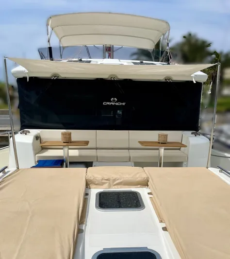  Yacht Photos Pics 2016 Cranchi Eco Trawler 53 Long Distance yacht with sunbathing area and shaded seating.