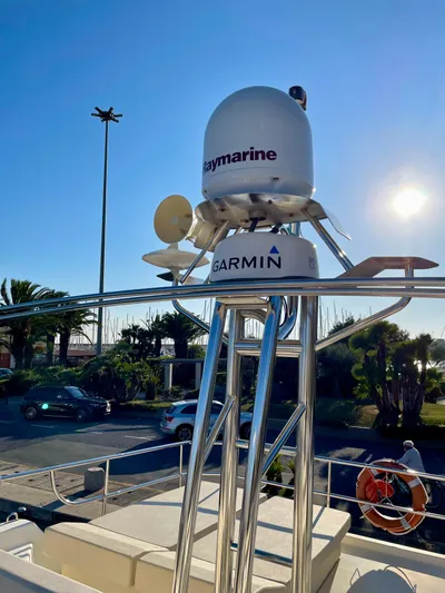  Yacht Photos Pics Radar equipment on 2016 Cranchi Eco Trawler 53 Long Distance under clear blue sky.