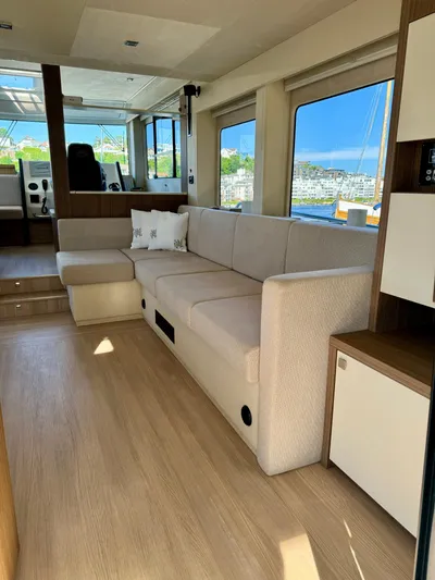  Yacht Photos Pics Interior of 2016 Cranchi Eco Trawler 53, featuring a modern, spacious living area with large windows.