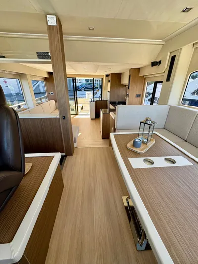  Yacht Photos Pics Interior of 2016 Cranchi Eco Trawler 53 Long Distance, featuring modern wood finishes and spacious layout.