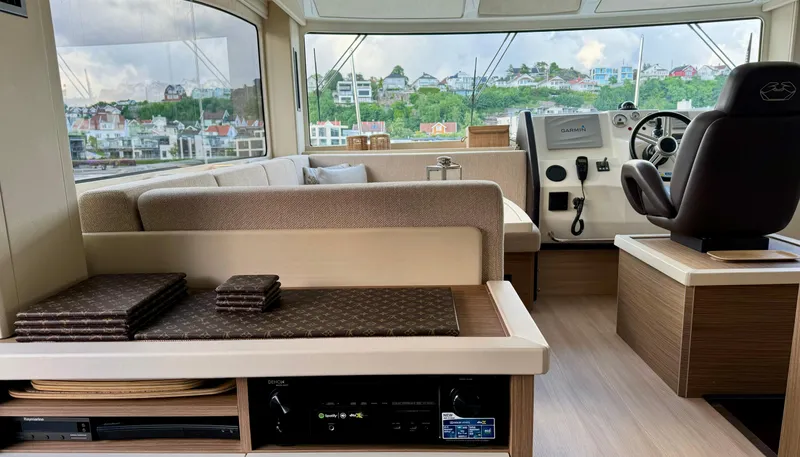 Yacht Photos Pics Interior of 2016 Cranchi Eco Trawler 53 Long Distance, featuring helm and seating area.