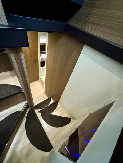  Yacht Photos Pics Interior of 2016 Cranchi Eco Trawler 53, featuring modern wood finishes and sleek design.