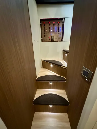  Yacht Photos Pics Staircase in 2016 Cranchi Eco Trawler 53 Long Distance with control panel.