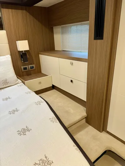  Yacht Photos Pics 2016 Cranchi Eco Trawler 53 Long Distance cabin with modern wood and white interior design.